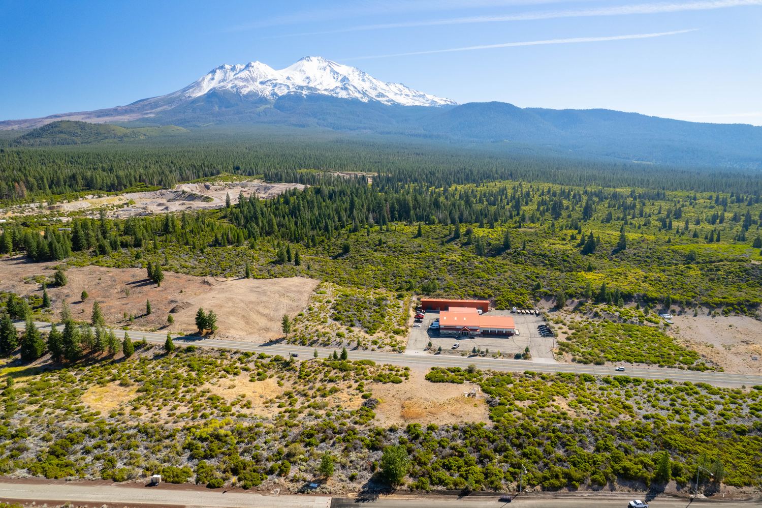 The parcel and Spring Hill Road with Mount Shasta beyond